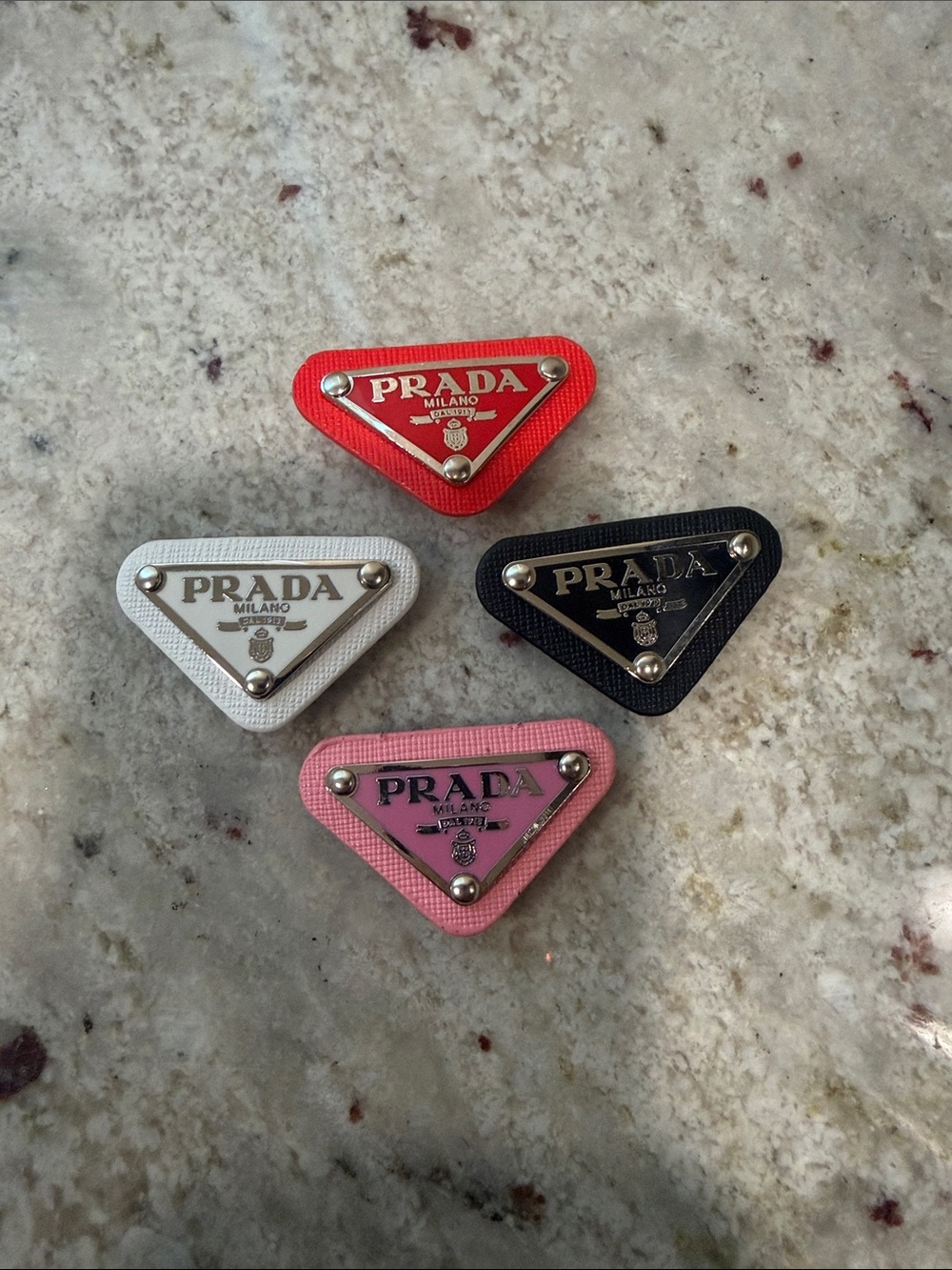 Prada Triangular Logo Badges in Red, White, Black & Pink